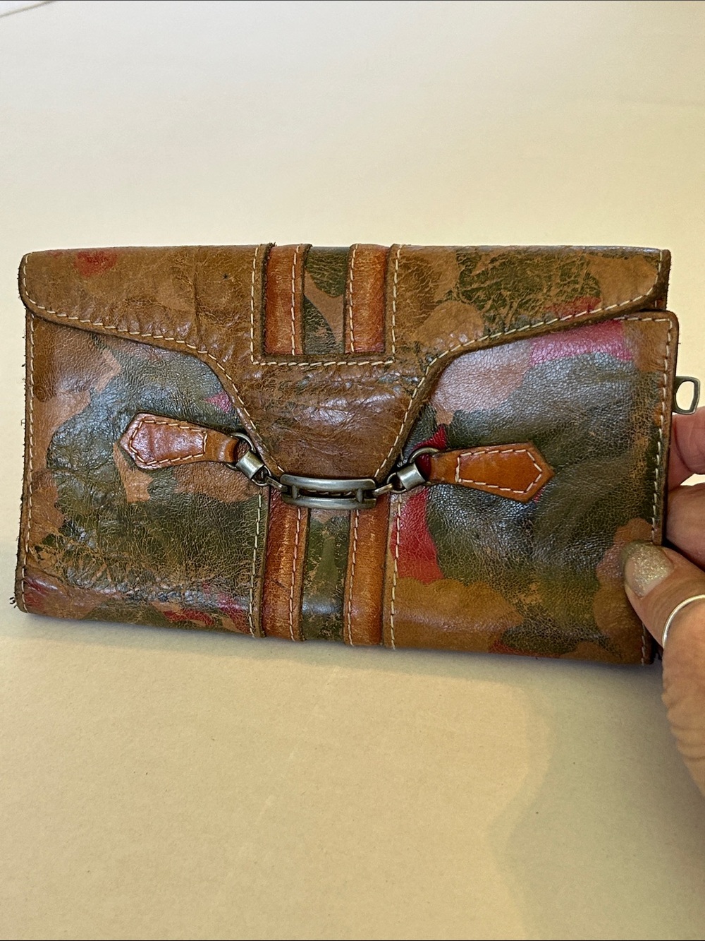 PATRICIA NASH LEATHER WALLET FEATURING A FLORAL DESIGN & METAL CLASP